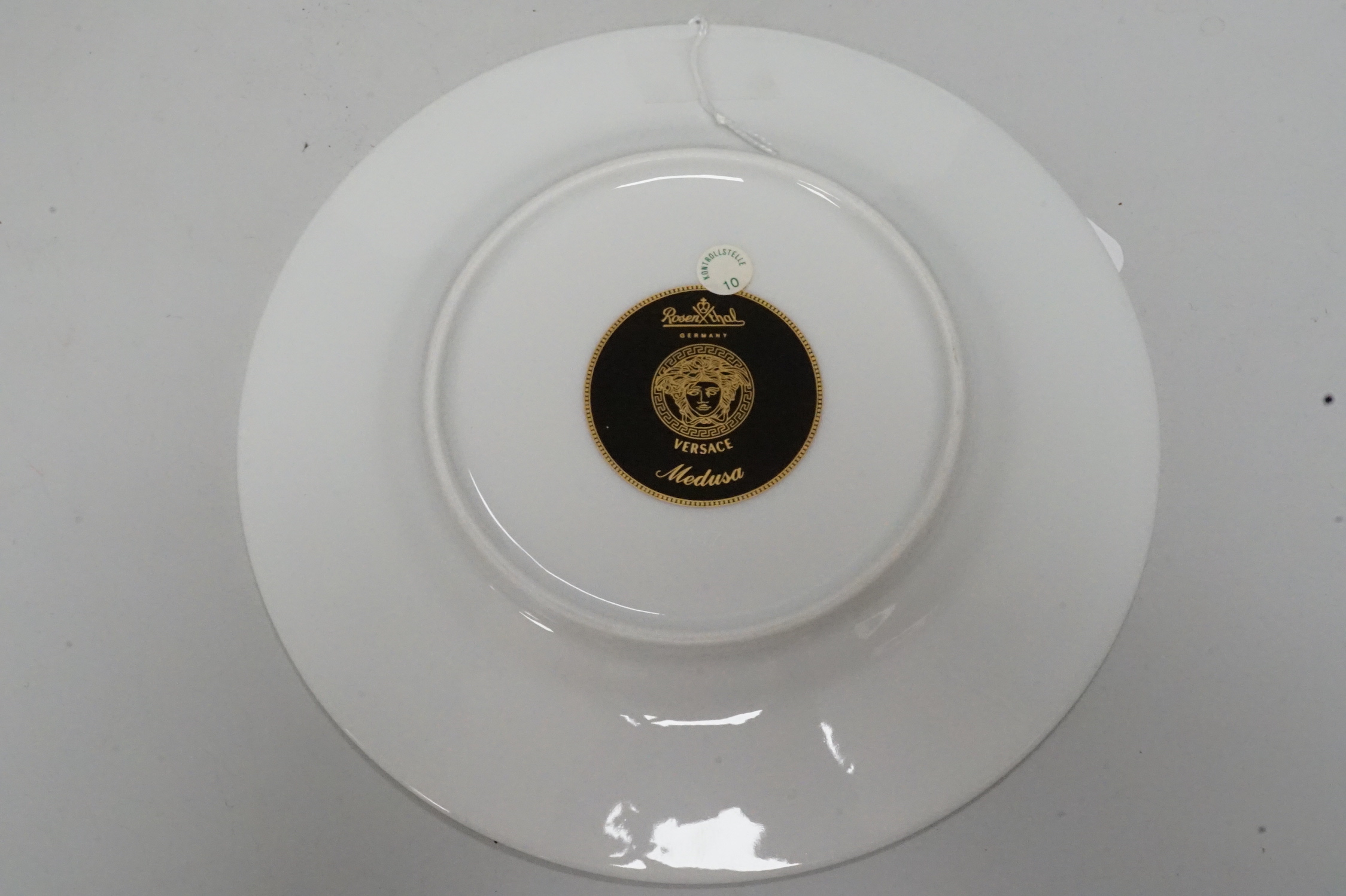 A pair of boxed Rosenthal Versace plates